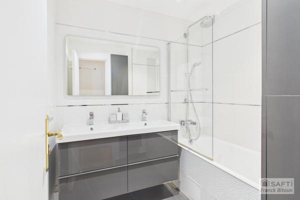 Vue SEINE, ÎLE DE LA JATTE et TOUR EIFFEL. Balcon, cave et box.