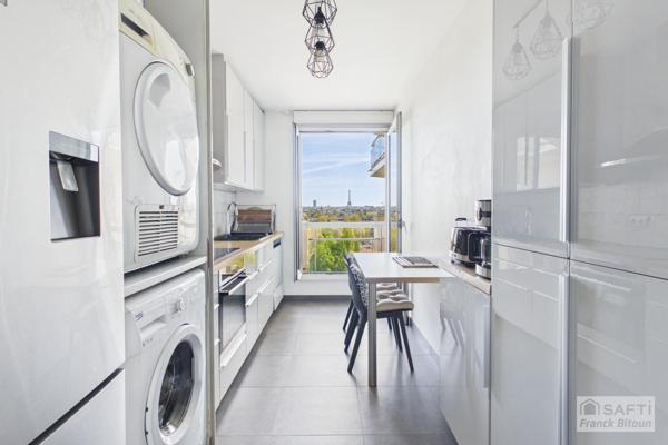 Vue SEINE, ÎLE DE LA JATTE et TOUR EIFFEL. Balcon, cave et box.