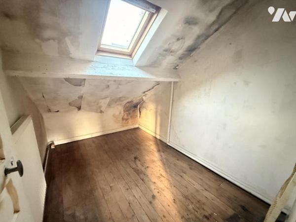 HENRIVILLE Maison avec porte cochère rue Jeanne d'Arc