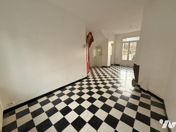 HENRIVILLE Maison avec porte cochère rue Jeanne d'Arc