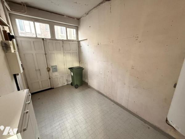 HENRIVILLE Maison avec porte cochère rue Jeanne d'Arc