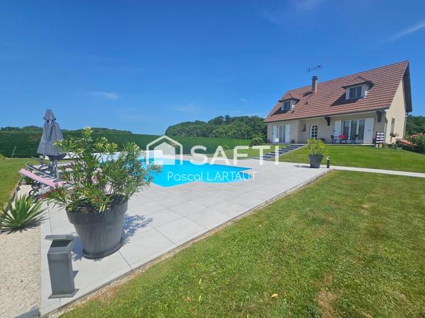 Maison familiale avec grand terrain et piscine