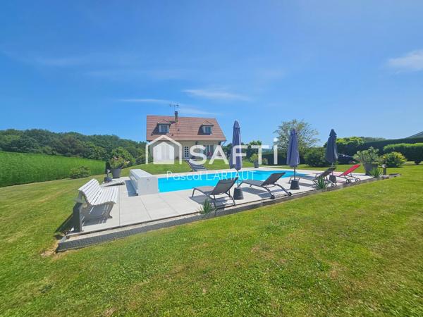 Maison familiale avec grand terrain et piscine