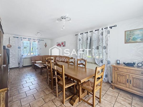 Maison familiale avec grand terrain et piscine