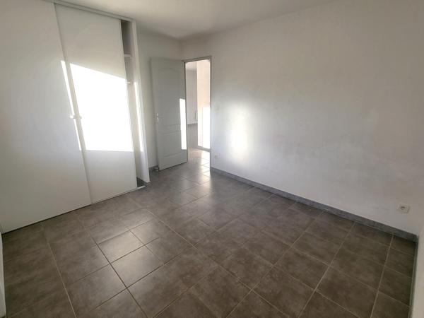 Au coeur de MORESTEL, APPARTEMENT T3 de 61 m² au 1er ét. petite  Résidence avec Parking