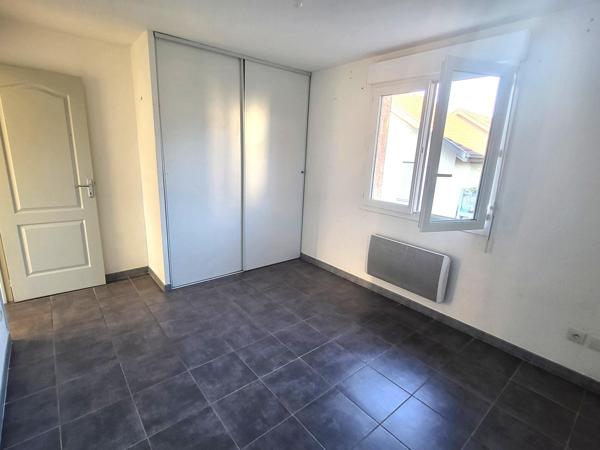 Au coeur de MORESTEL, APPARTEMENT T3 de 61 m² au 1er ét. petite  Résidence avec Parking