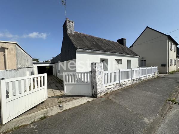 Maison de 107m² à rénover à Vannes Ouest avec jardin, garage et véranda proche commodités