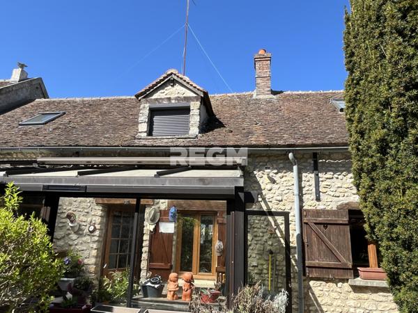 Maison en pierre avec vie de plain-pied et grange