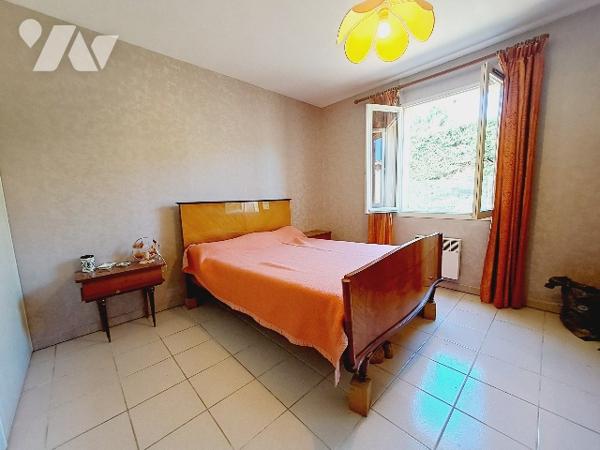 Montélimar, maison de 131m² habitable avec 5 chambres, garage et jardin.