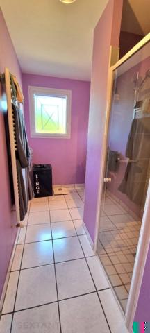 TRES AGREABLE DEMEURE DE PLAIN PIED DE 76 M2 LOVEE DANS UN CADRE BUCOLIQUE