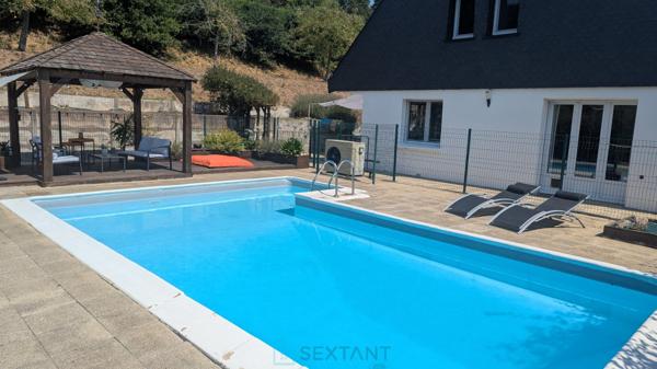 Belle propriété familiale avec piscine chauffée et vue dégagée