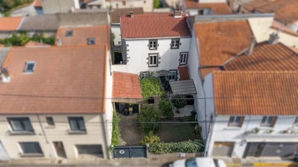 Maison de ville 108 m² avec jardin garage et cave