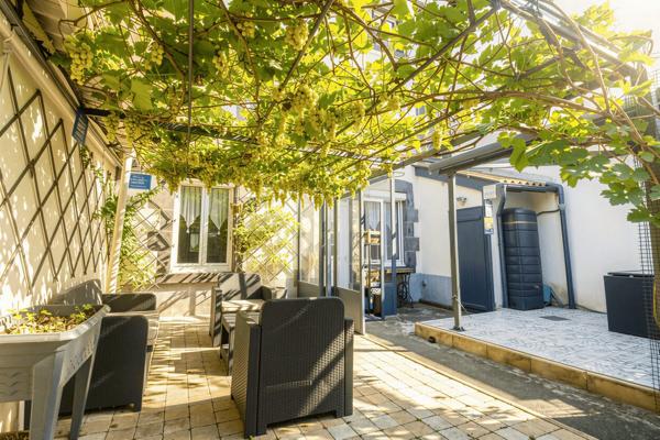 Maison de ville 108 m² avec jardin garage et cave
