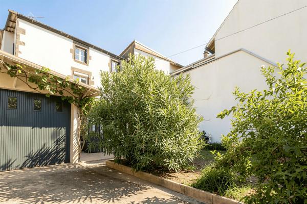 Maison de ville 108 m² avec jardin garage et cave