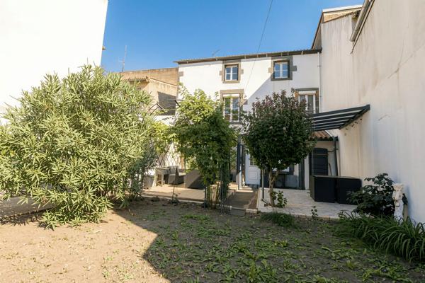 Maison de ville 108 m² avec jardin garage et cave