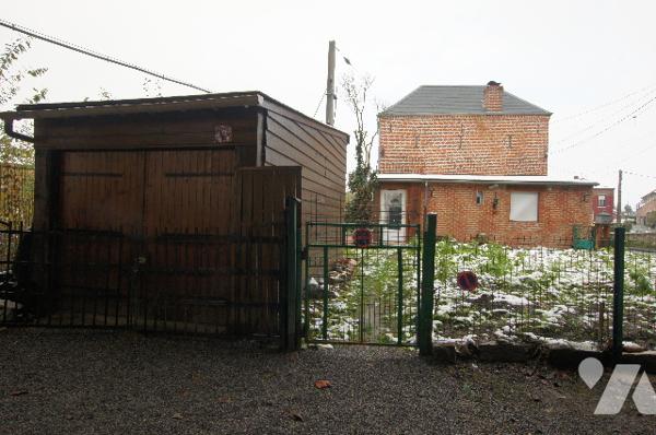 Immeuble locatif comprenant 2 logements meublés