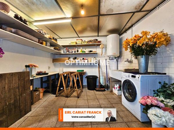 LOCAL COMMERCIAL DE 103 M² AVEC UN APPAREMENT :