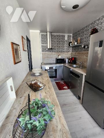 Appartement rénové avec balcon - 2 chambres