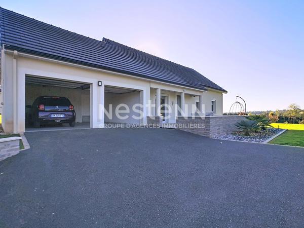 Maison avec vie de plain à vendre à Ussac 151 m² - 4 chambres - double garage - 1 sdb - 1 sde - 3 wc - 2 Terrasses