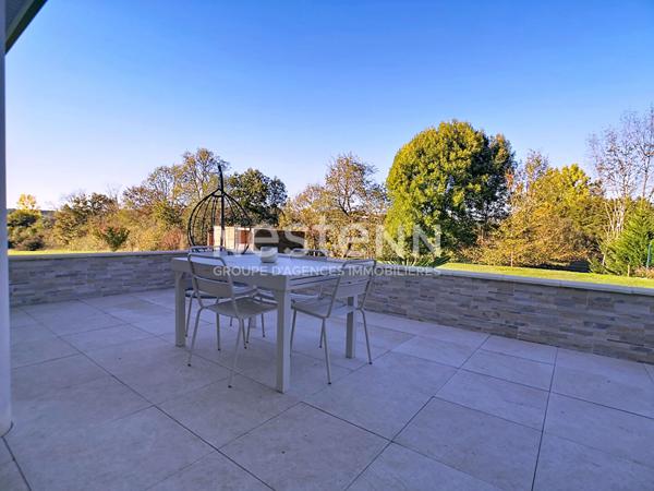 Maison avec vie de plain à vendre à Ussac 151 m² - 4 chambres - double garage - 1 sdb - 1 sde - 3 wc - 2 Terrasses