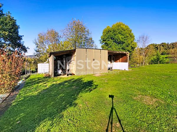 Maison avec vie de plain à vendre à Ussac 151 m² - 4 chambres - double garage - 1 sdb - 1 sde - 3 wc - 2 Terrasses