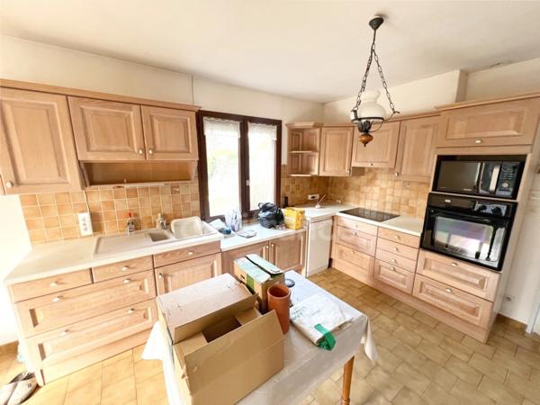 Vente Maison de plain-pied 4 pièces à MANOSQUE (04) - Jardin 740m2, garage, combles aménagés, proche commodités