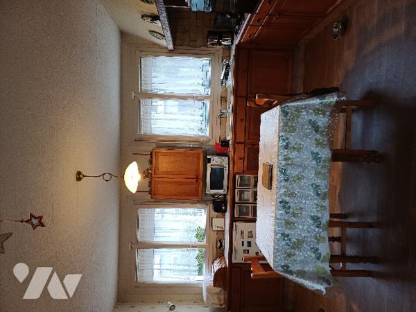 A OUTREAU, maison d'habitation mitoyenne d'environ 90 m² de surface habitable et son terrain.