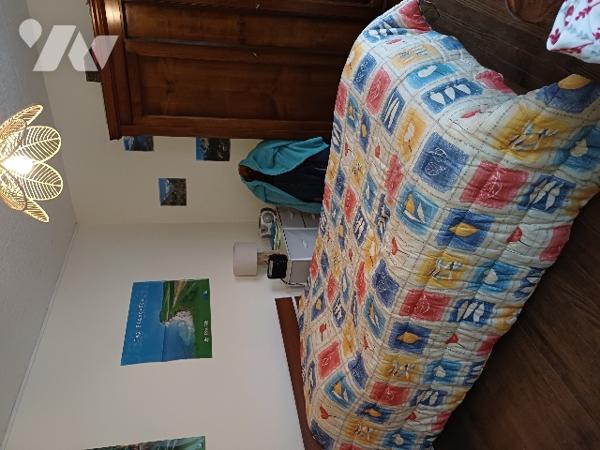 A OUTREAU, maison d'habitation mitoyenne d'environ 90 m² de surface habitable et son terrain.