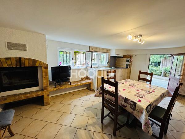 Maison individuelle jardin et garage.