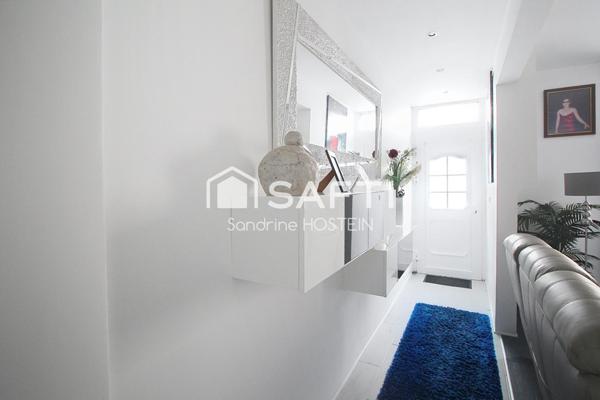 Maison mitoyenne rénovée de 120m2 hab avec 2 terrasses.