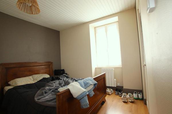 Immeuble 2 appartements + 2 commerces