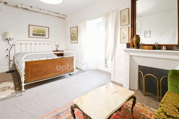 Maison de charme de 104 m² - 4 pièces - 3 chambres ave cour et garage - MAGNAC LAVAL (87)