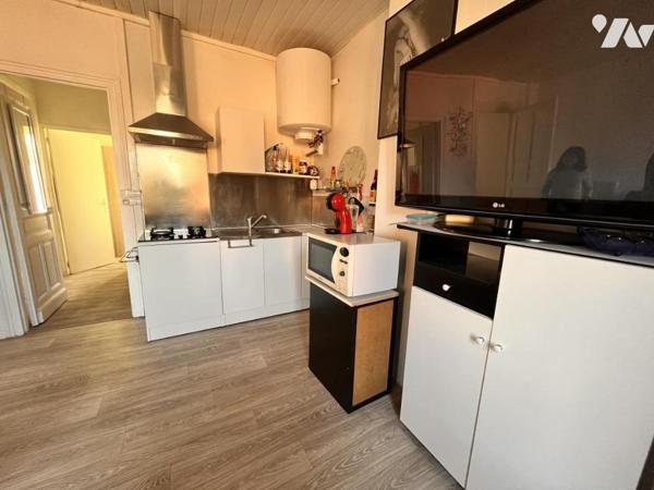 Proche centre-ville et voies rapides - immeuble comprenant 3 appartements 