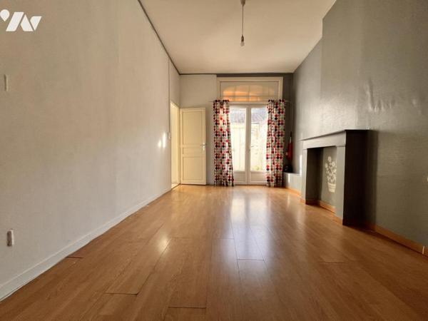 Proche centre-ville et voies rapides - immeuble comprenant 3 appartements 