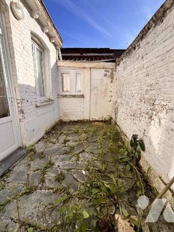 Proche centre-ville et voies rapides - immeuble comprenant 3 appartements 
