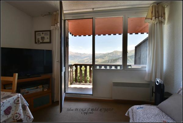 Pra Loup – Appartement plein sud avec vue panoramique, balcon, cave et casier à skis