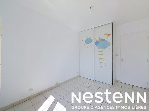 GENAS AZIEU - Secteur Pasteur - Appartement 3 pièces + terrasse et place de stationnement privative