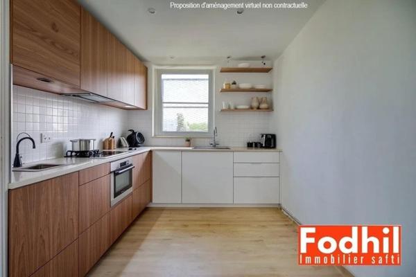 Appartement familial 5 pièces de 81 m² avec parking et une cave.