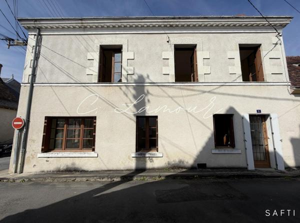Maison de ville et jardin non attenant