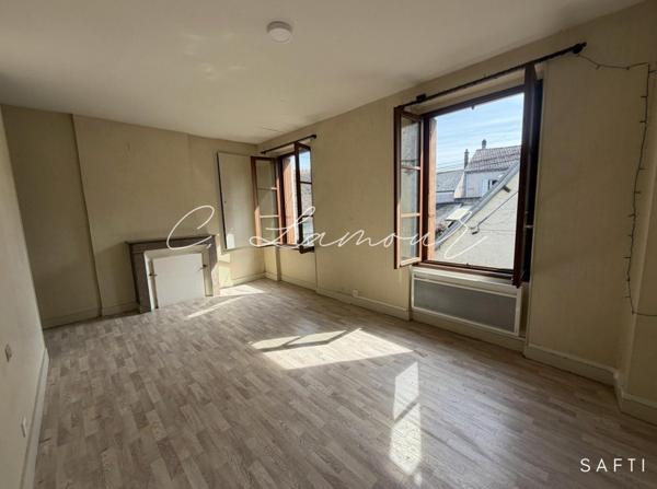 Maison de ville et jardin non attenant