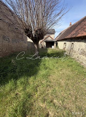 Maison de ville et jardin non attenant
