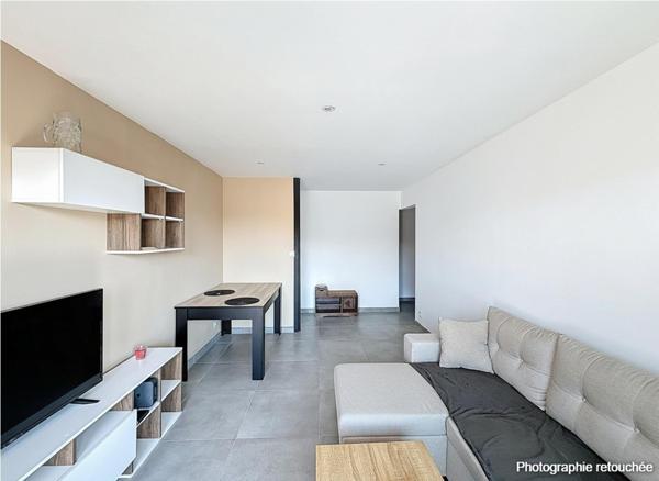 Appartement 3 pièces lumineux avec balcon, parking et cave