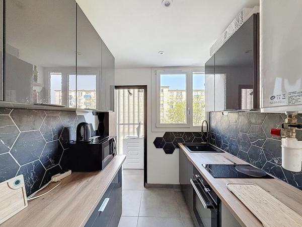 Appartement 3 pièces lumineux avec balcon, parking et cave