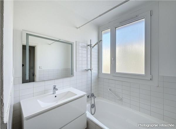 Appartement 3 pièces lumineux avec balcon, parking et cave