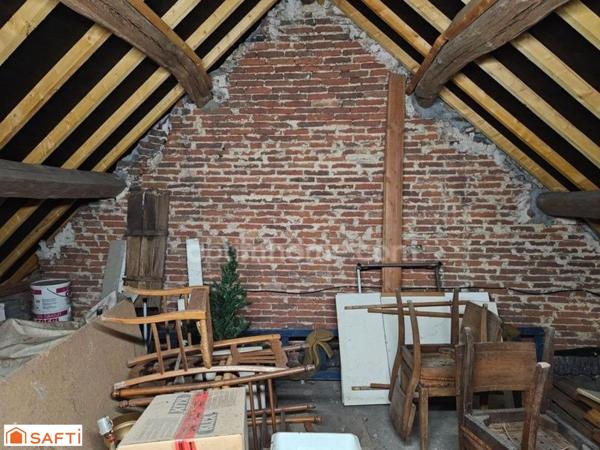 Maison de plain-pied à rénover avec jardin et garage