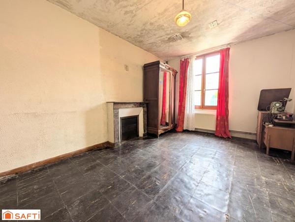 Maison de plain-pied à rénover avec jardin et garage