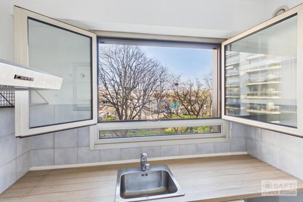 FRONT DE SEINE - 2 PIÈCES DE 53 M² - VUE SEINE ET ÎLE DE LA JATTE