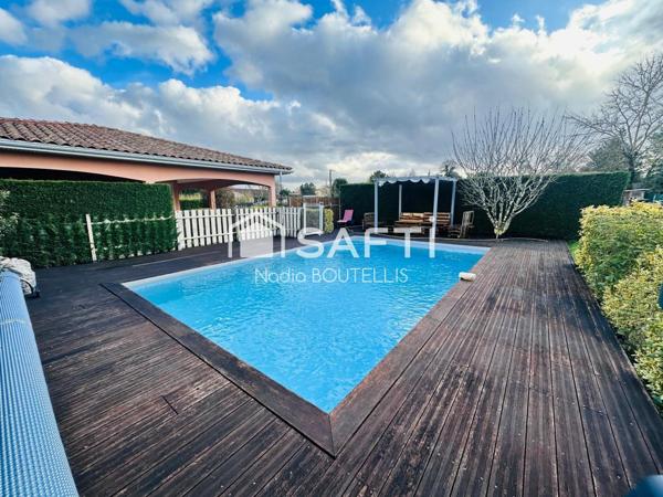 Grand terrain, sous sol, piscine, 4 chambres.