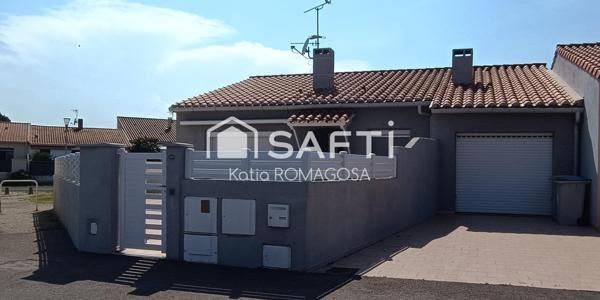 Maison 3 faces de plain pied, 4 pièces avec garage à St Cyprien.