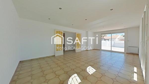 Maison 3 faces de plain pied, 4 pièces avec garage à St Cyprien.